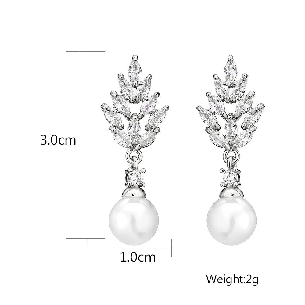 Geometric stud earrings with micro inlaid zircon detailing and floral design in gold, platinum, or rose gold plating