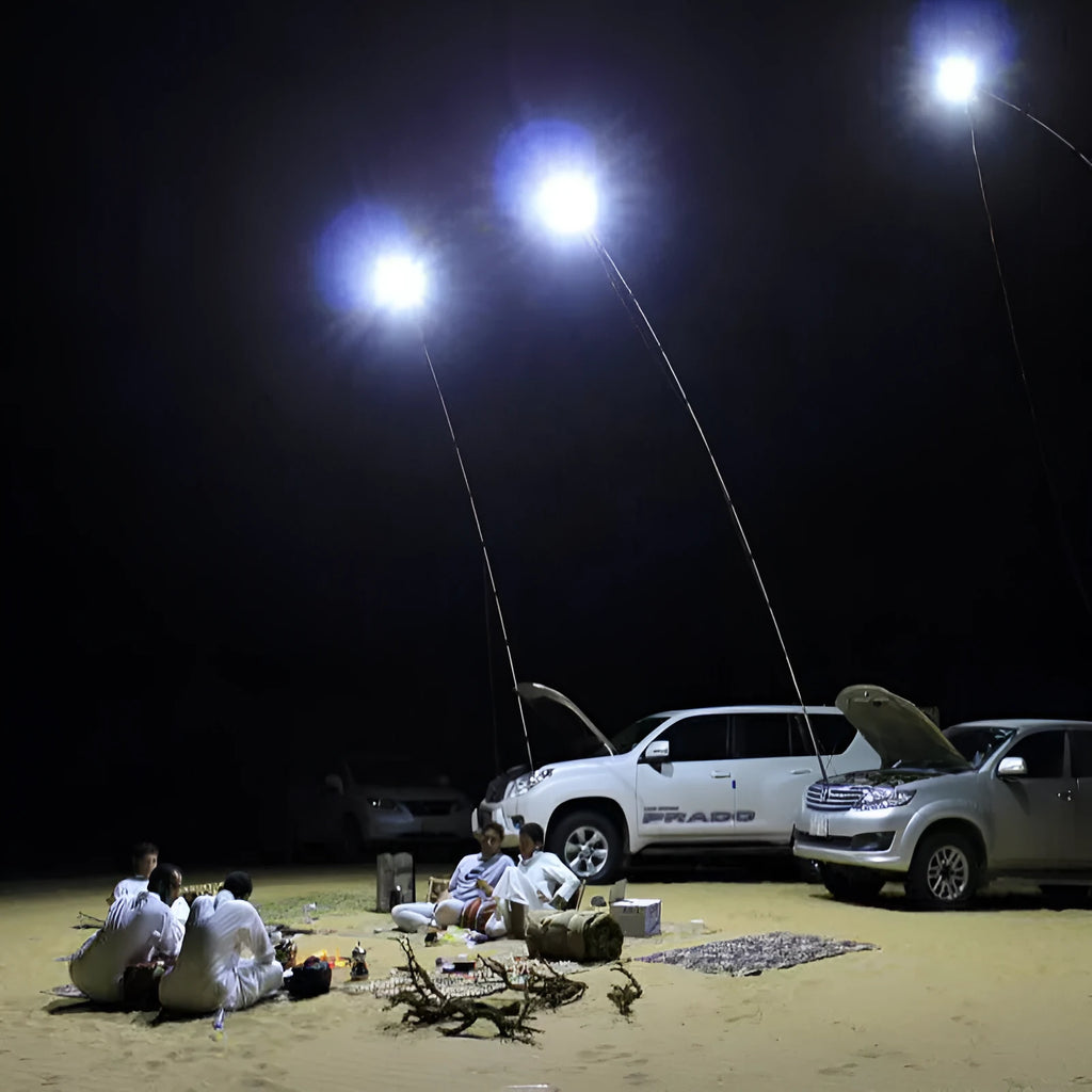 White LED fishing rod light with telescopic pole extended, showing remote control