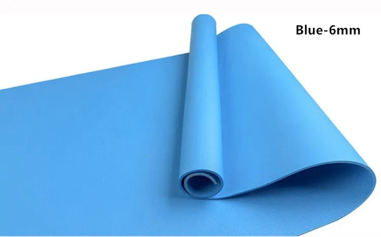 Red EVA yoga mat with textured anti-skid surface, shown rolled and unrolled.