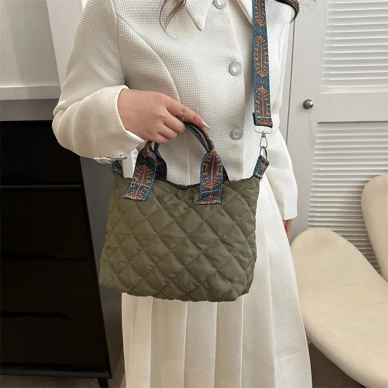 Soft Oxford cloth messenger bag with embroidery details and internal phone pocket in horizontal square shape
