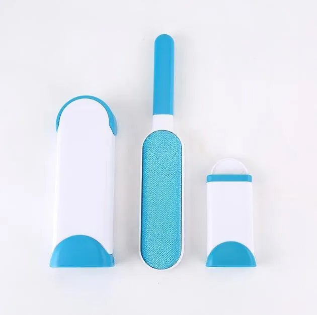 Blue reusable pet hair removal comb with double-sided brush and self-cleaning base for furniture.