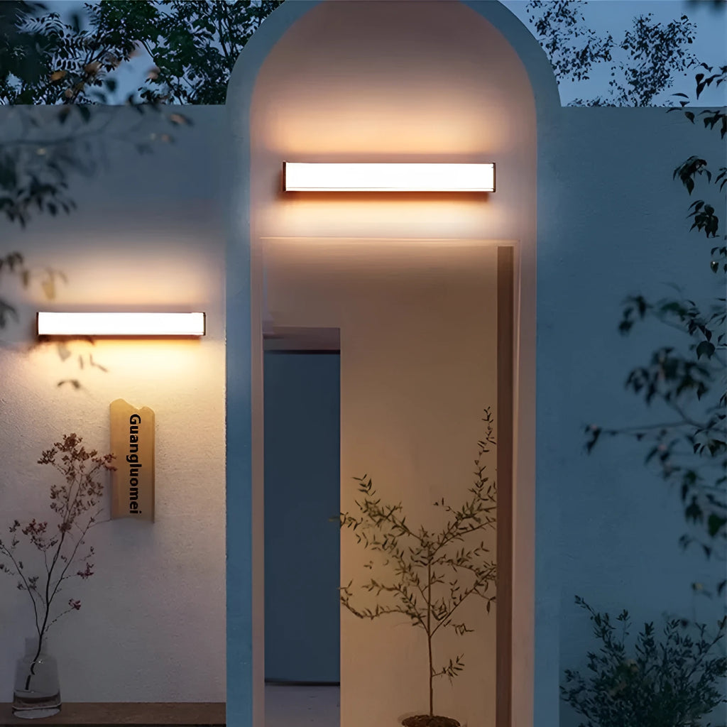 Modern simple outdoor wall lamp shown mounted on an exterior wall, suitable for villa or hotel entrance.