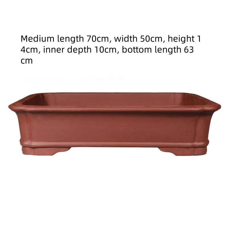 Rectangular purple clay flowerpot showing traditional handmade construction with multiple size options