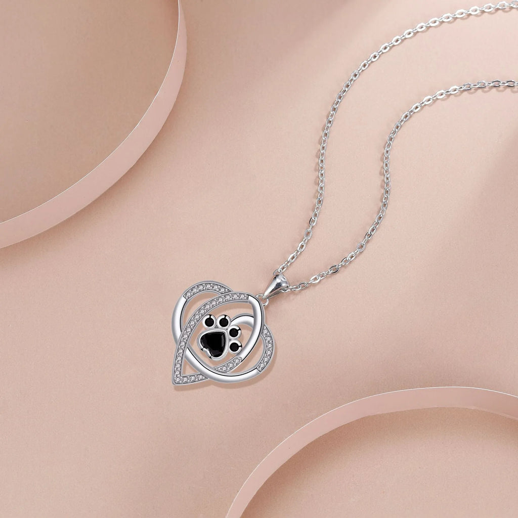 Copper pendant necklace with dog and cat paw footprints design on cross chain