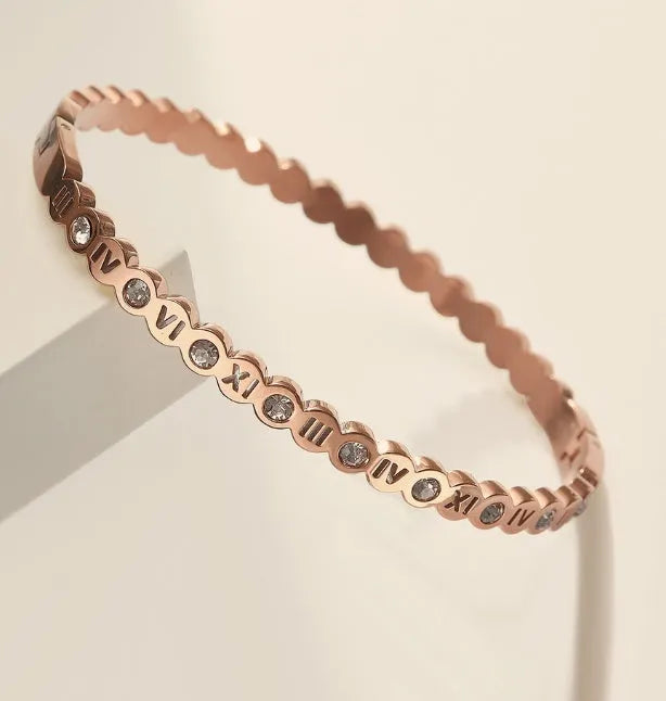 Korean style titanium steel bracelet with number design in gold, rose gold, or steel colour.