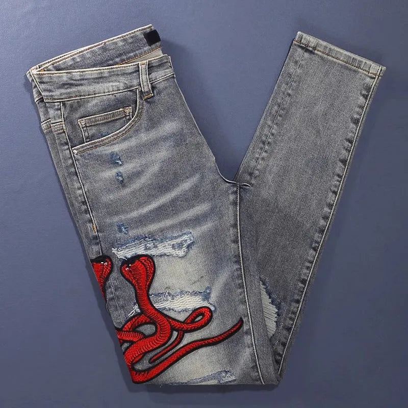 Men's slim fit jeans with distressed patches in washed-out old colour, showing front and back views