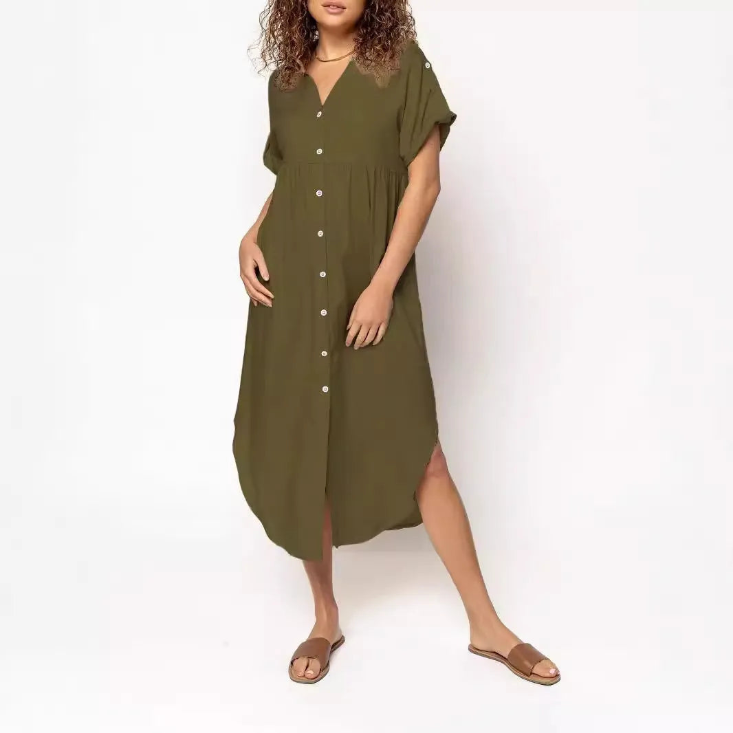 Women's loose-fit mid-length casual dress with button front in a solid colour.