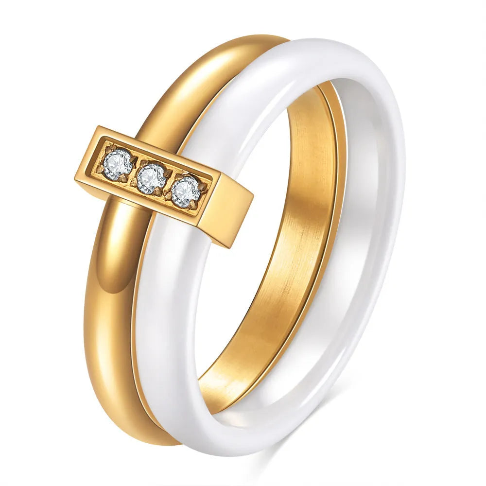 Ceramic ring with geometric shape and zirconium stitching in steel black or golden white colour