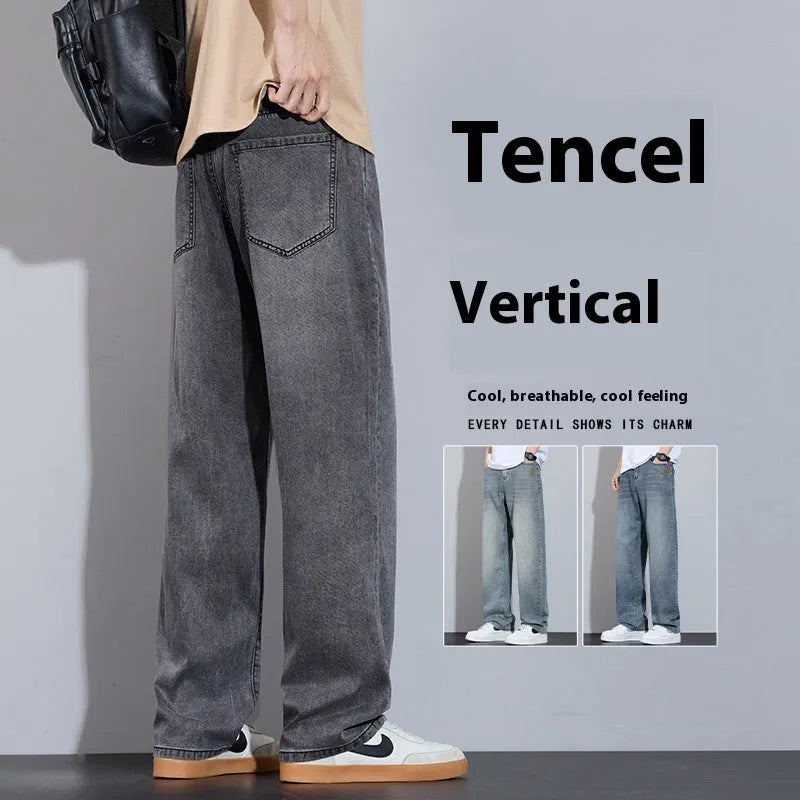 Light blue ice silk straight-leg wide trousers laid flat, showing zip fly and relaxed leg cut.