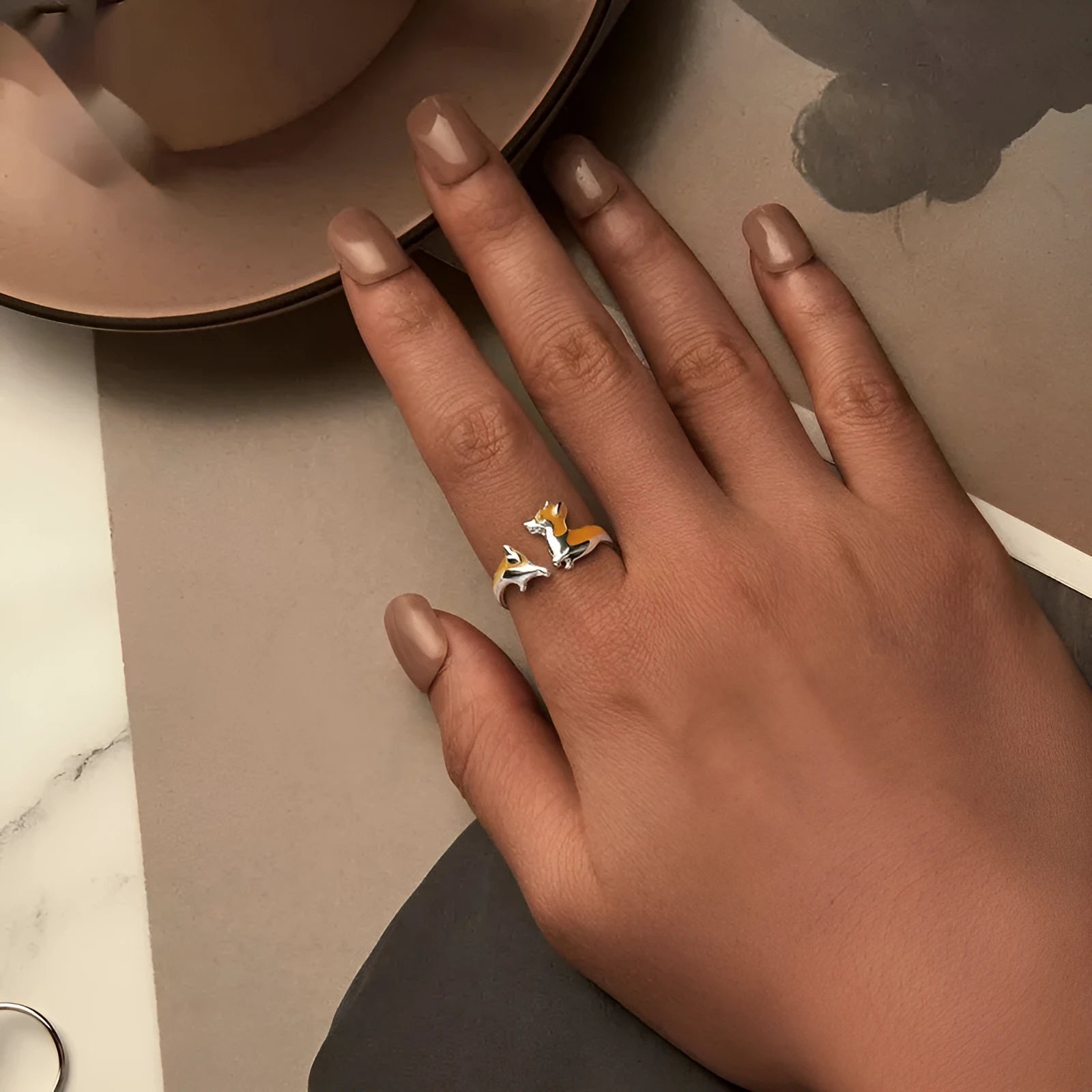 Silver cartoon corgi ring with electroplated finish in colour SCR1014-E.