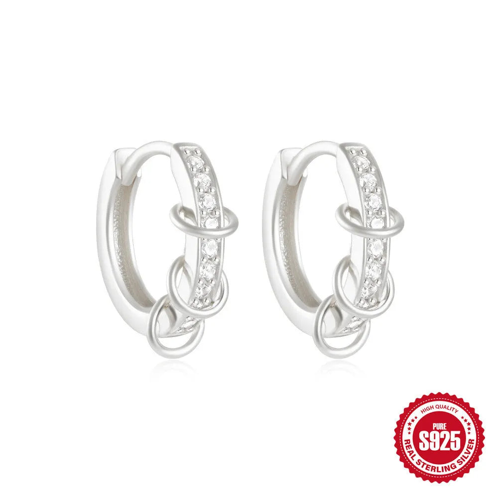 Small round geometric sterling silver stud earrings with a diamond shape, available in gold or silver finish.