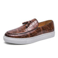 Men's black casual sneakers with a tassel detail on the artificial PU upper and a round toe.