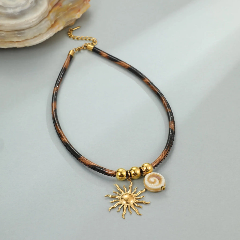 Women's stainless steel necklace with geometric leopard leather pendant on gold chain