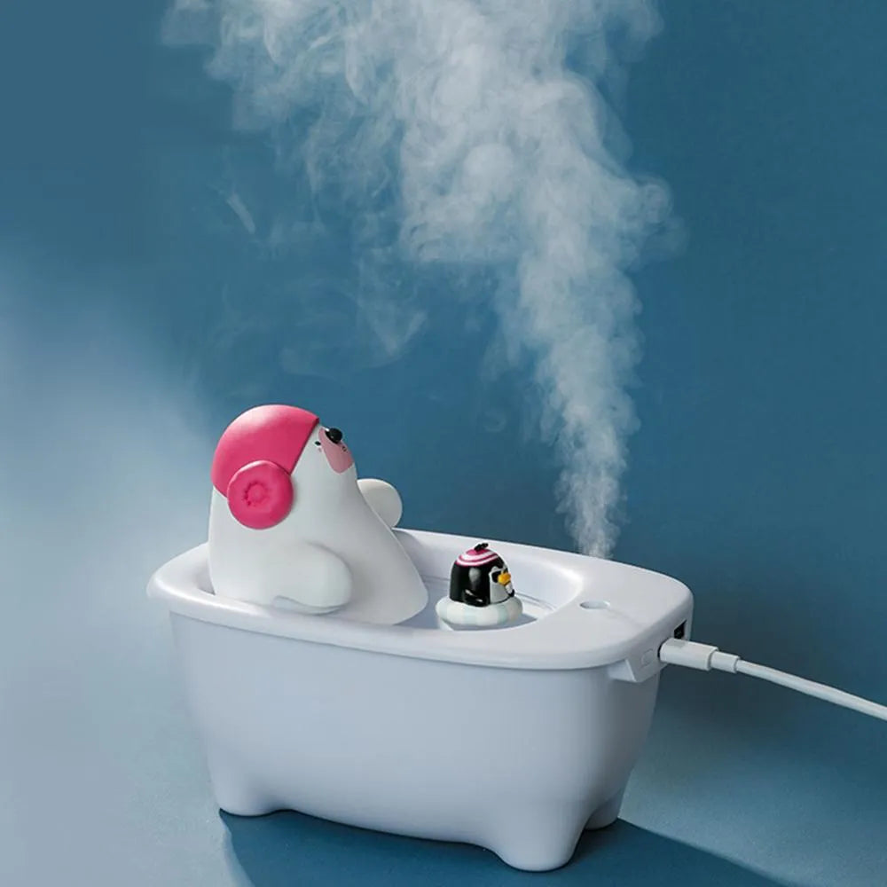 White USB air humidifier and scent diffuser with 550ml tank on a desk