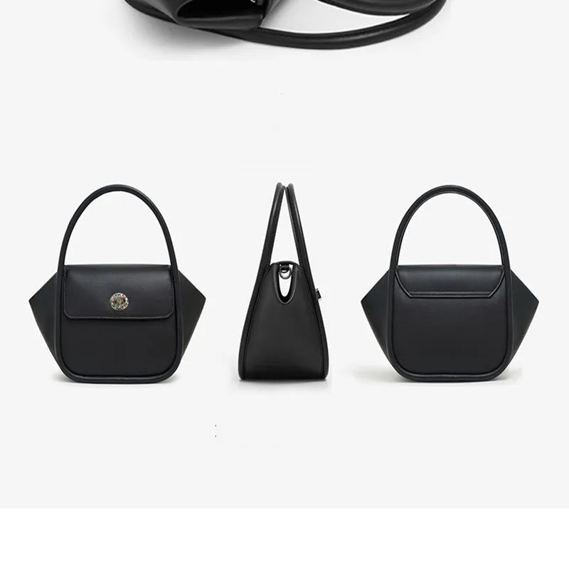 Soft cow leather wing-shaped tote handbag with a buckle and cross-body strap in four colour options.