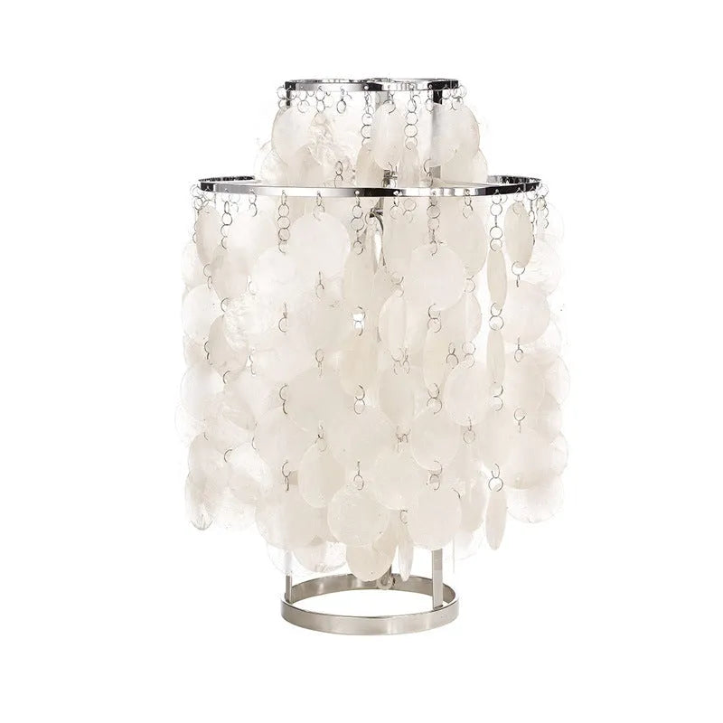 Modern shell bedside table lamp in chrome finish with 30cm diameter shade