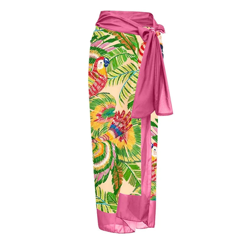 Women's pink floral print one-piece swimsuit with V-neck and a separate cover-up skirt.