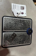English Style leather foot massage cushion with wireless remote control and LCD display showing massage modes.