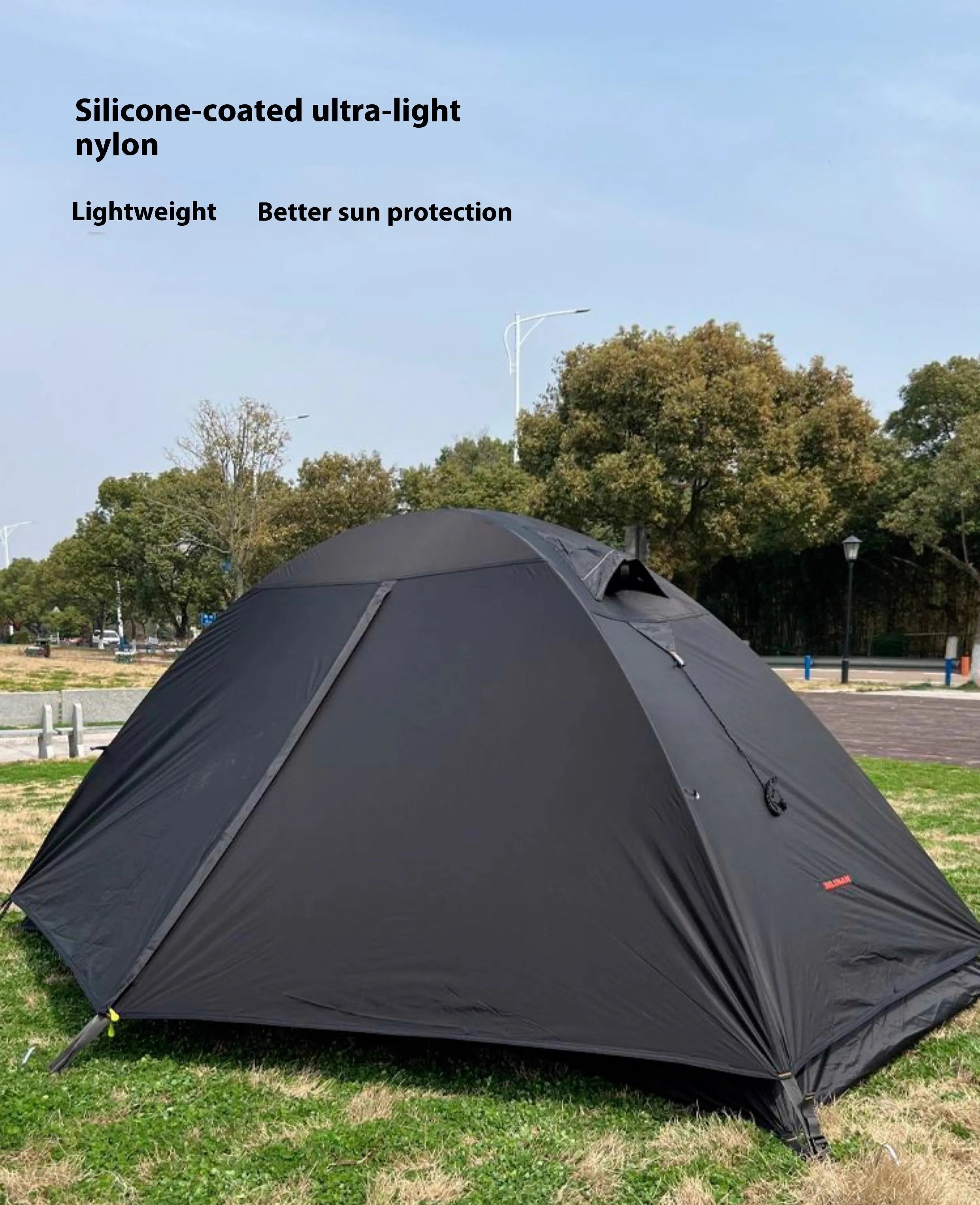 Single person double-layer hiking tent with aluminium poles, shown in a choice of red, black, or orange colours.