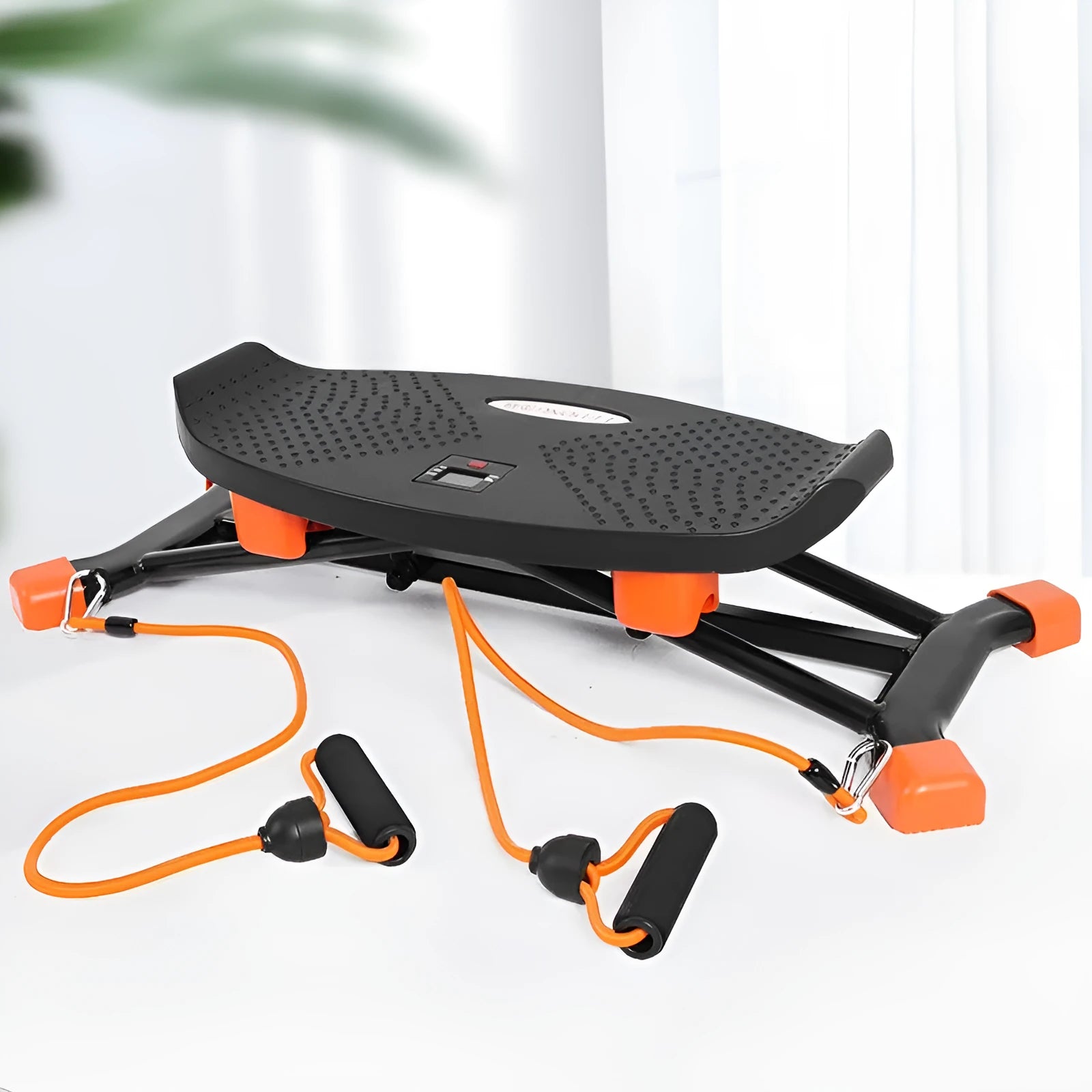 Black mini fitness skiing machine for home indoor exercise with elastic hand straps.