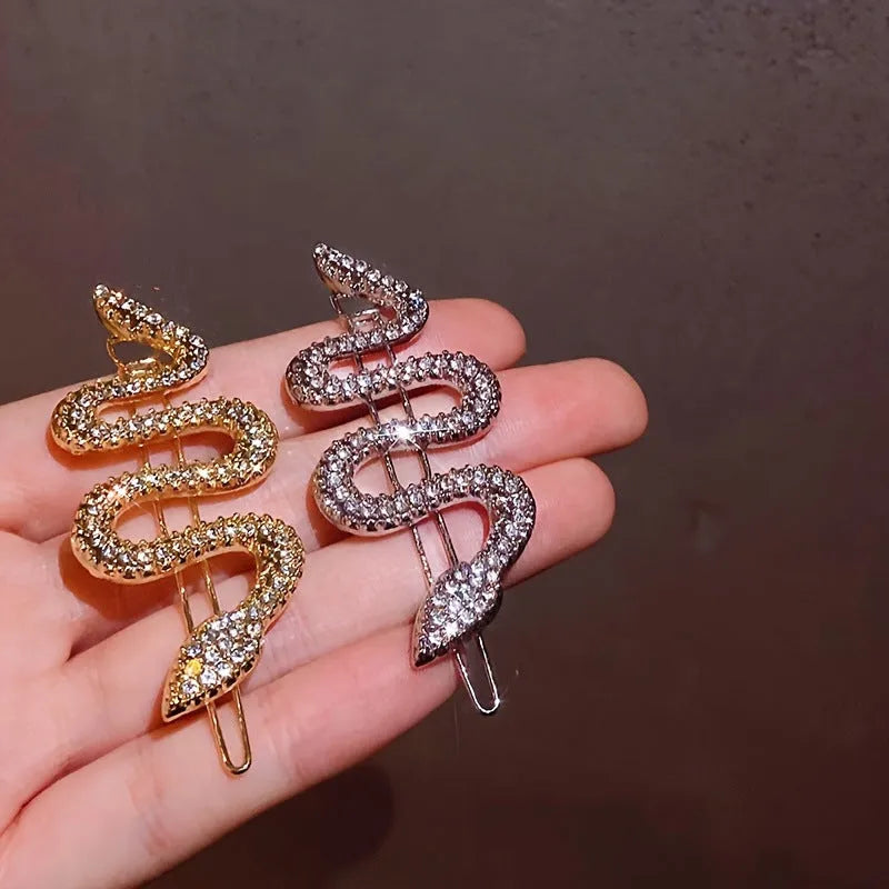 Gold and silver vintage snake hair barrettes with rhinestone detailing on alloy clips.