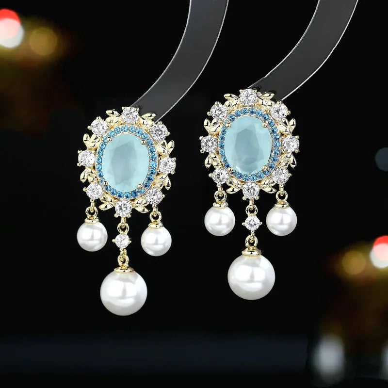 Oval geometric pearl tassel earrings with zircon stones in light purple colour