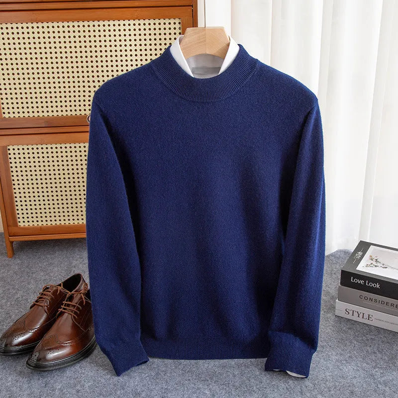 Men's loose fit half-turtleneck wool sweater in a neutral colour on a hanger.