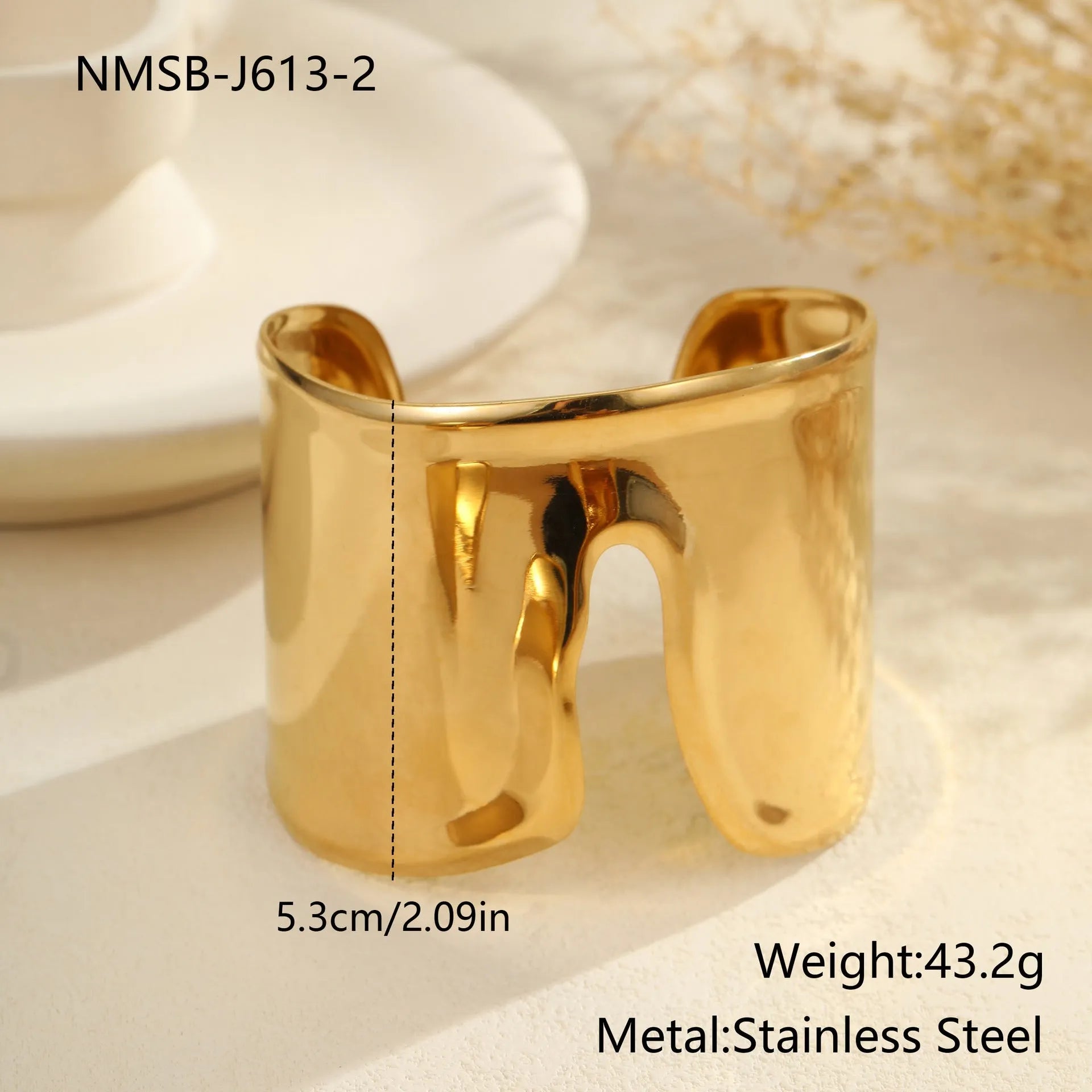 Women's gold plated stainless steel bracelet with exaggerated wide geometric wave design and niche opening