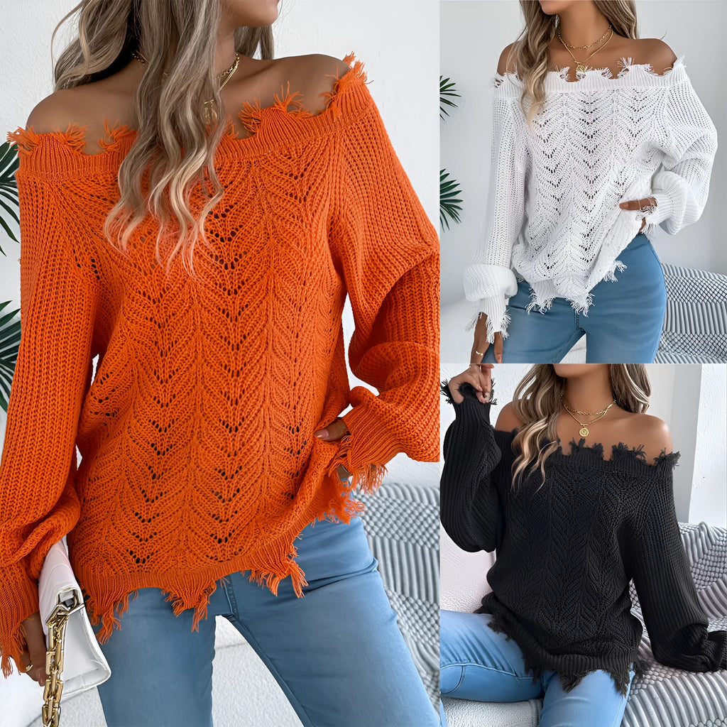 A woman wearing a white hollow-out cut off-the-shoulder pullover sweater in a street fashion style.