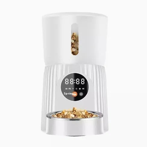 Black intelligent pet feeder with LCD screen showing feeding schedule and portion settings