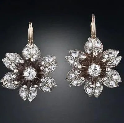 Women's retro fashion earrings in electroplated silver colour made from alloy metal