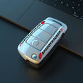 Carbon fibre style car key cover with mirrored finish in carbon pattern and white colour options