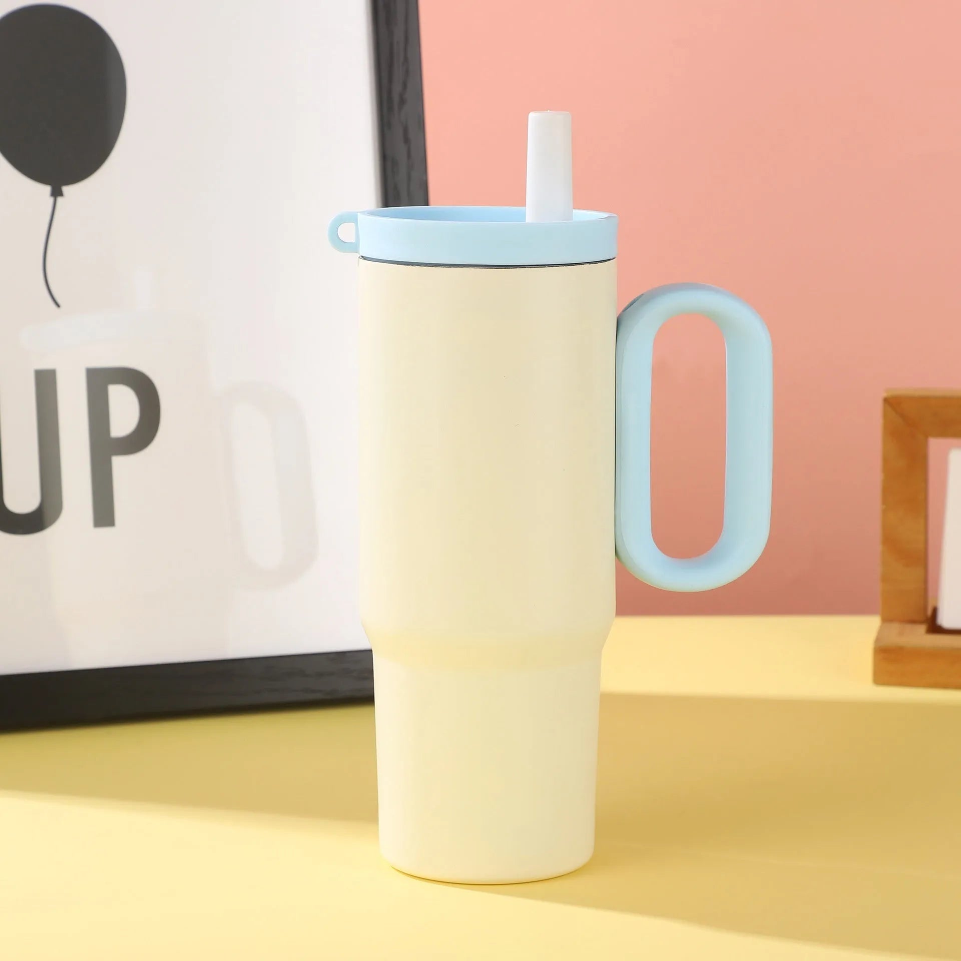 Large stainless steel insulated straw cup with handle in multiple colour options.