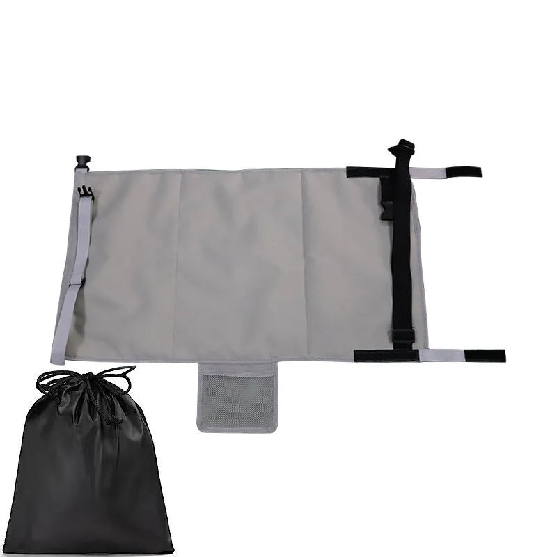 Portable blue children's aircraft seat extender with adjustable pedal device and matching drawstring pocket.