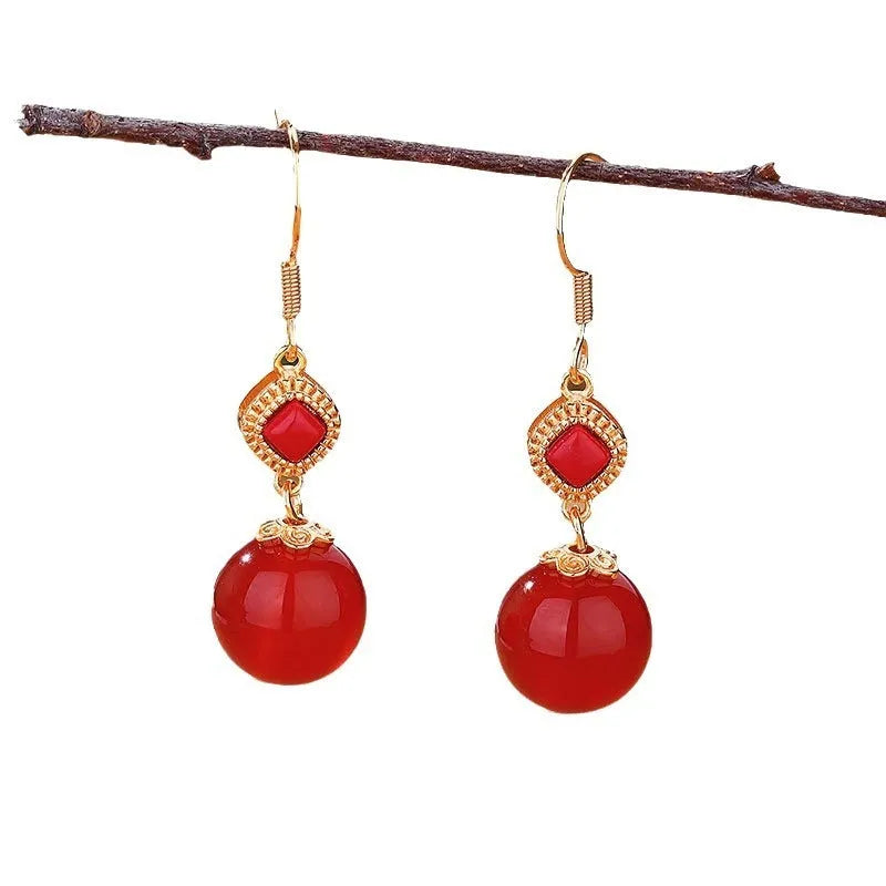 Geometric copper earrings with red agate beads and electroplated silver detailing