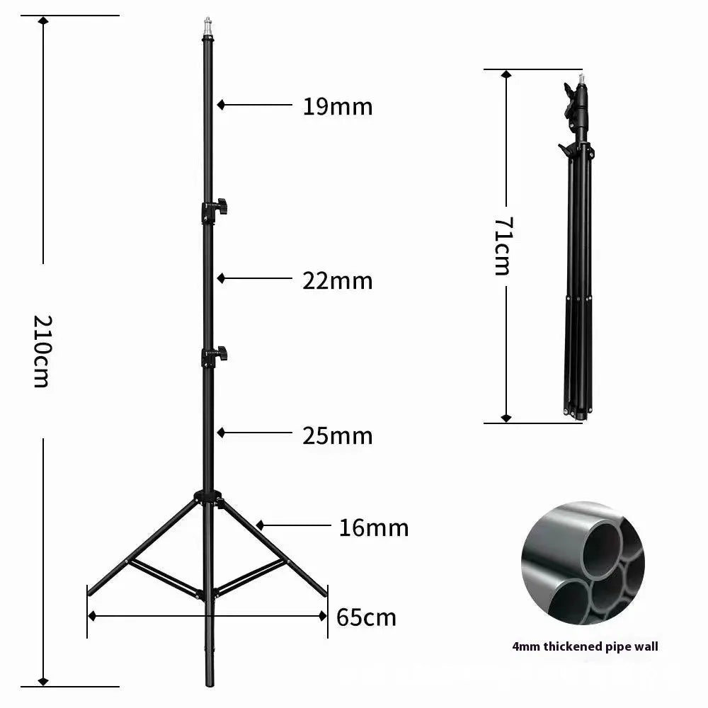 Frosted finish tripod light stand with mobile phone holder mounted, showing carbon steel construction and adjustable legs