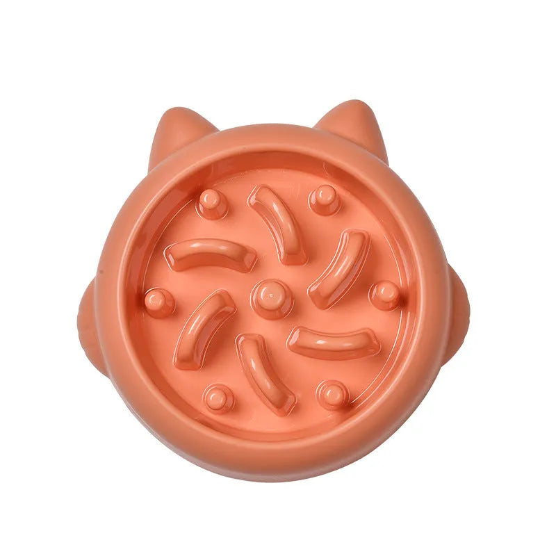 Green slow feeder dog bowl with raised bone-shaped ridges inside