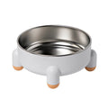 Green stainless steel pet bowl with a non-slip base and raised high foot for dogs and cats.