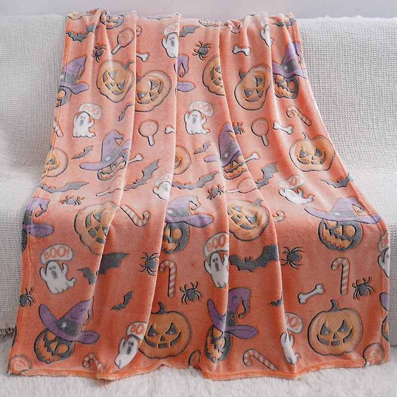 Cartoon print flannel blanket for children shown in two sizes.