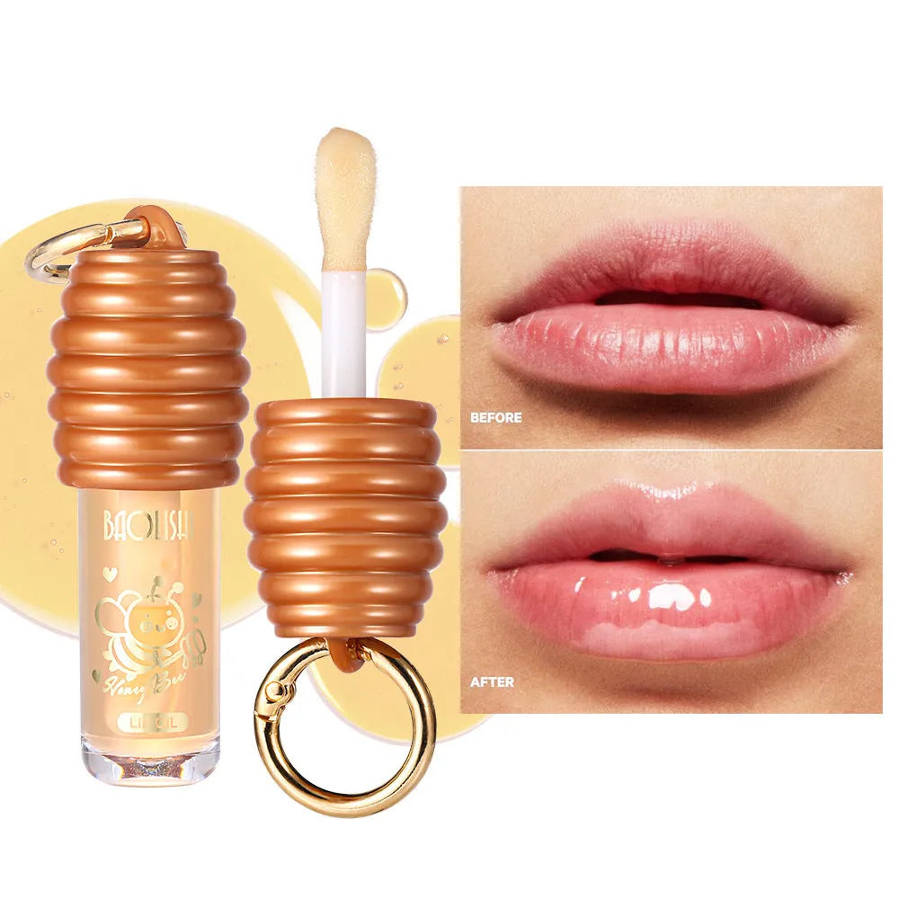 Honey lip gloss in portable keychain pannier bag packaging for on-the-go moisturising