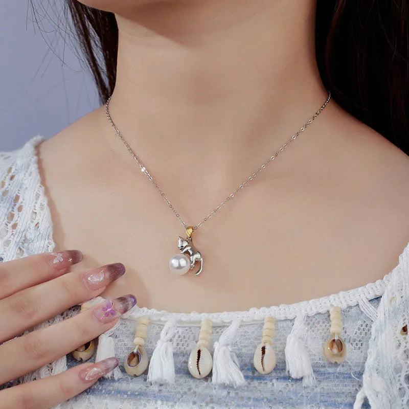Niche design sterling silver clavicle chain necklace with a detailed cat pendant.