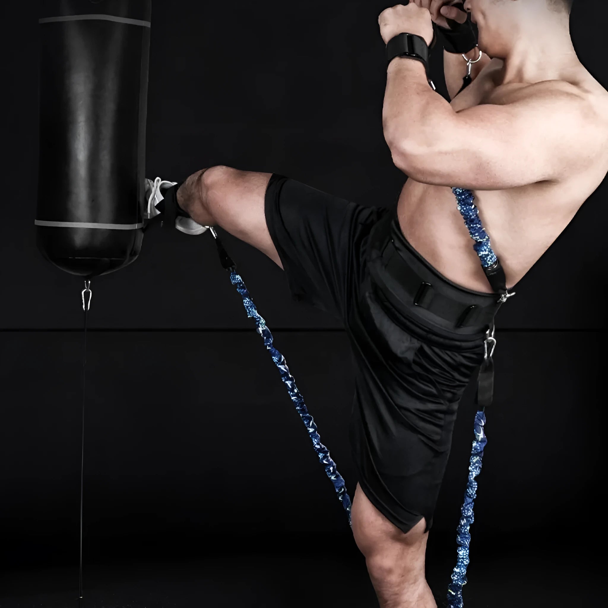 Fitness chest expander elastic belt with red, blue, black, and green resistance sleeves on a TPE tube.