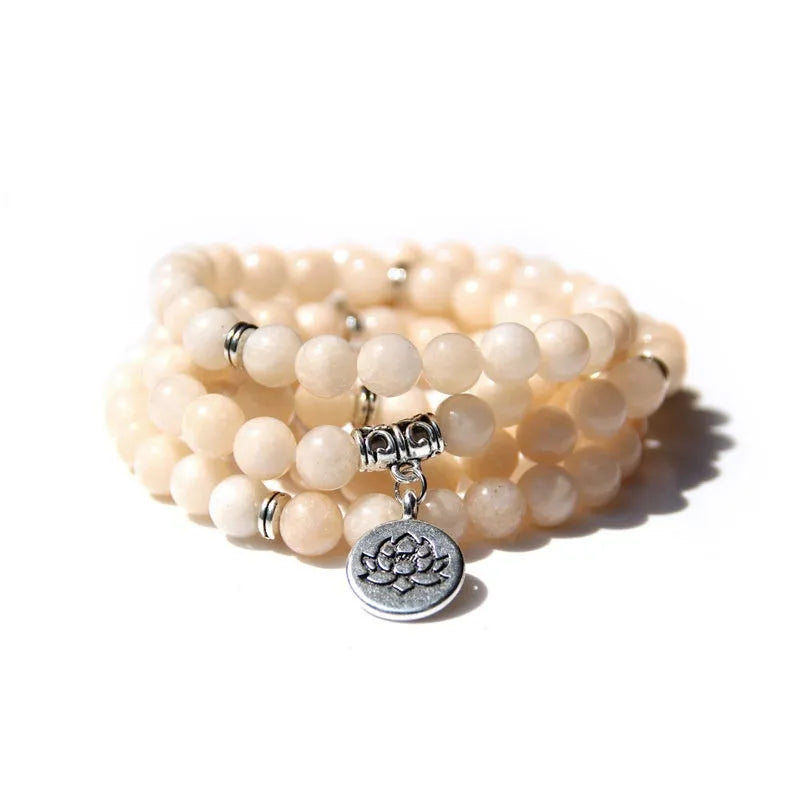Women's vintage-style bracelet with a natural stone angel echeveria lotus pendant on a chain.