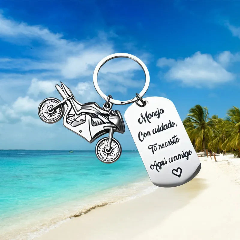 Stainless steel motorcycle keychain with velvet gift pouch in modern minimalist design