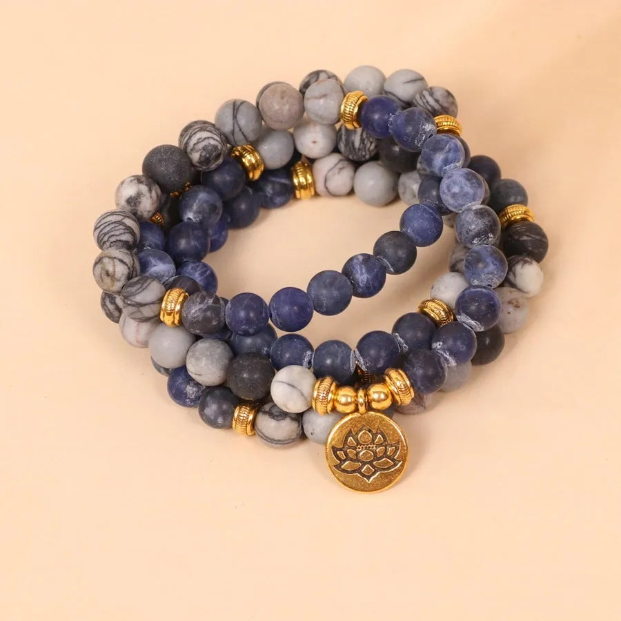 Blue patterned network stone beads on multi-layer alloy metal bracelet showing fresh sweet style