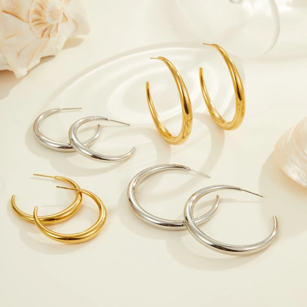 Titanium steel hoop earrings with 18K gold plating in small and large sizes