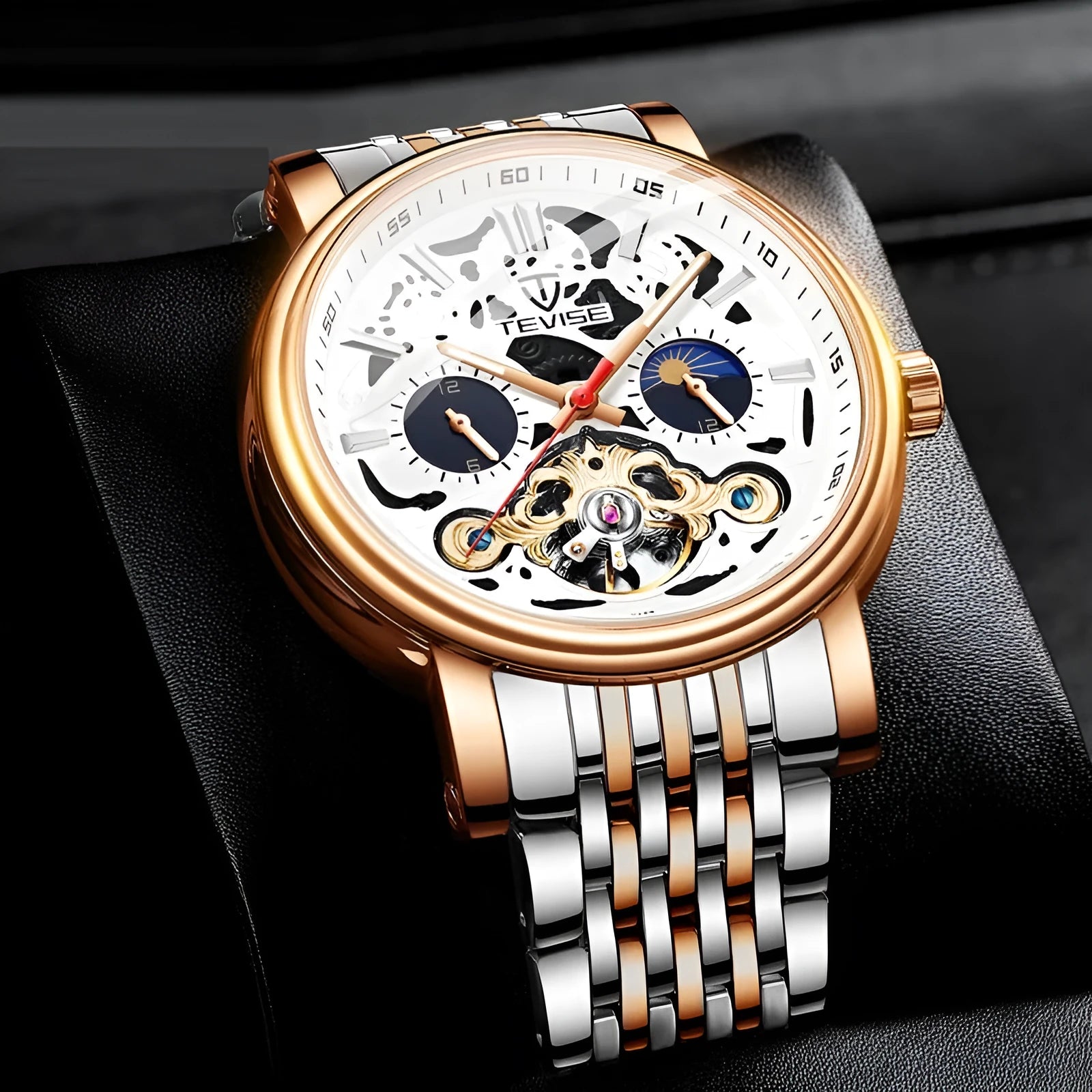 Men's fashion tourbillon mechanical watch with luminous dial on a metal bracelet, showing water resistant case.