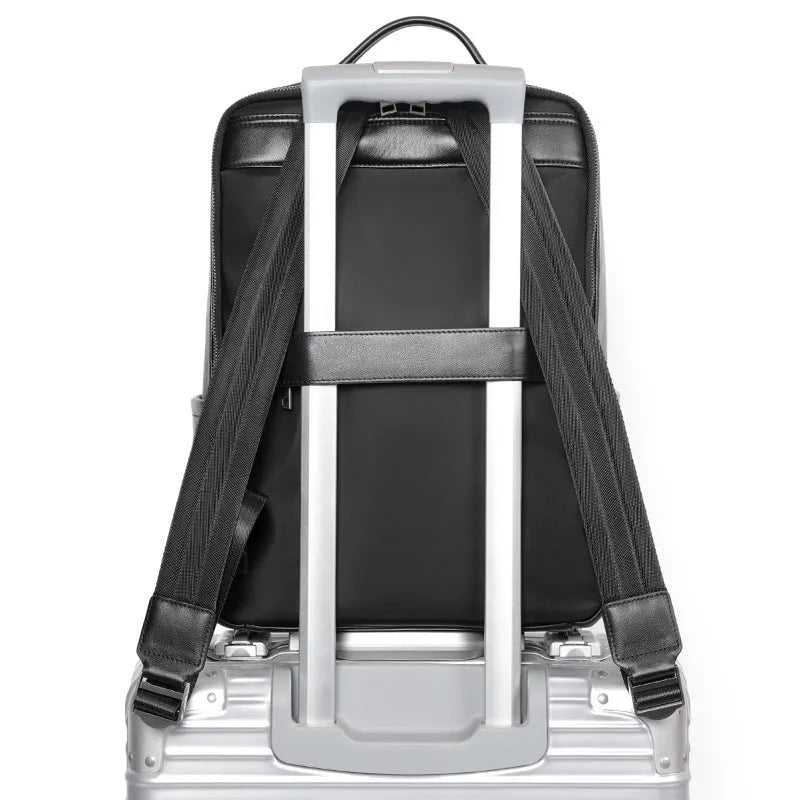 Men's large capacity leather computer backpack in black with woven detailing