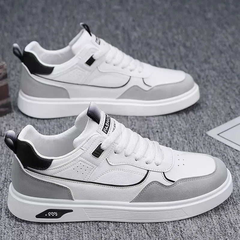 Men's low-top canvas shoes in black with leather stitching and mesh lining, shown on a white background.