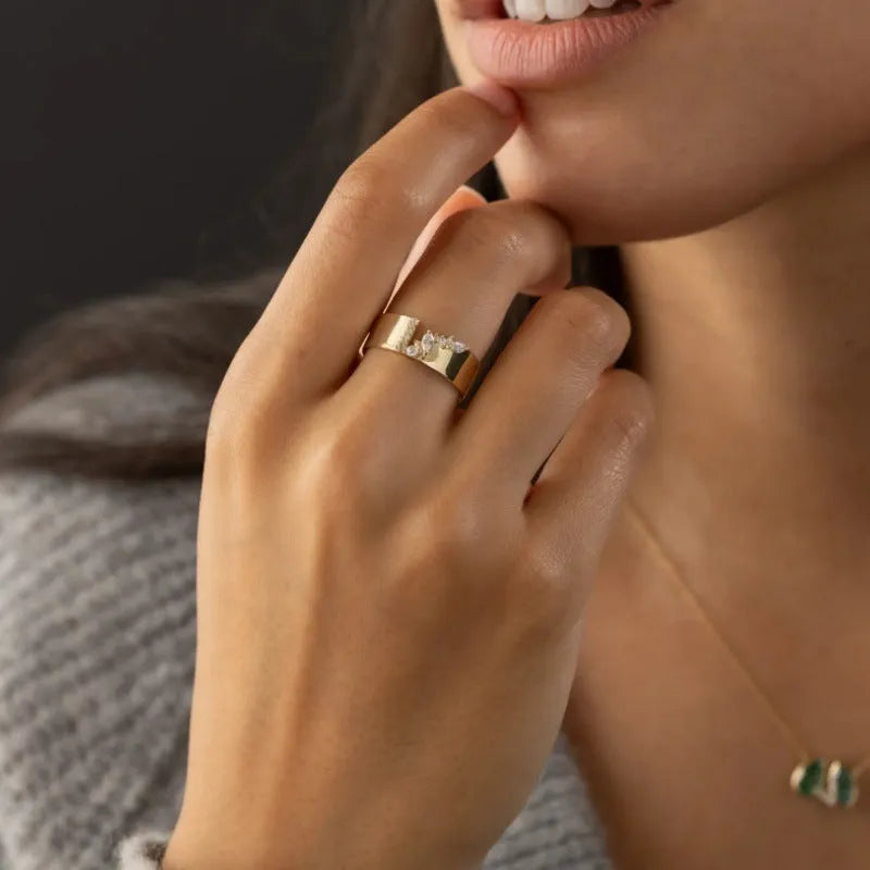 Gold electroplated copper women's ring with shining zircon accents, shown in UK size options
